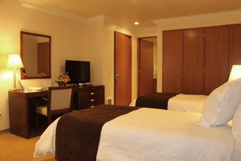 Suites Obelisk México DF Habitación foto
